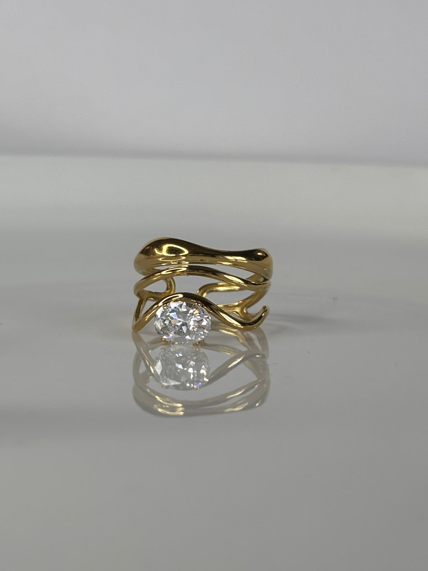 Dalila l Bague ajustable dorée et zircon blanc