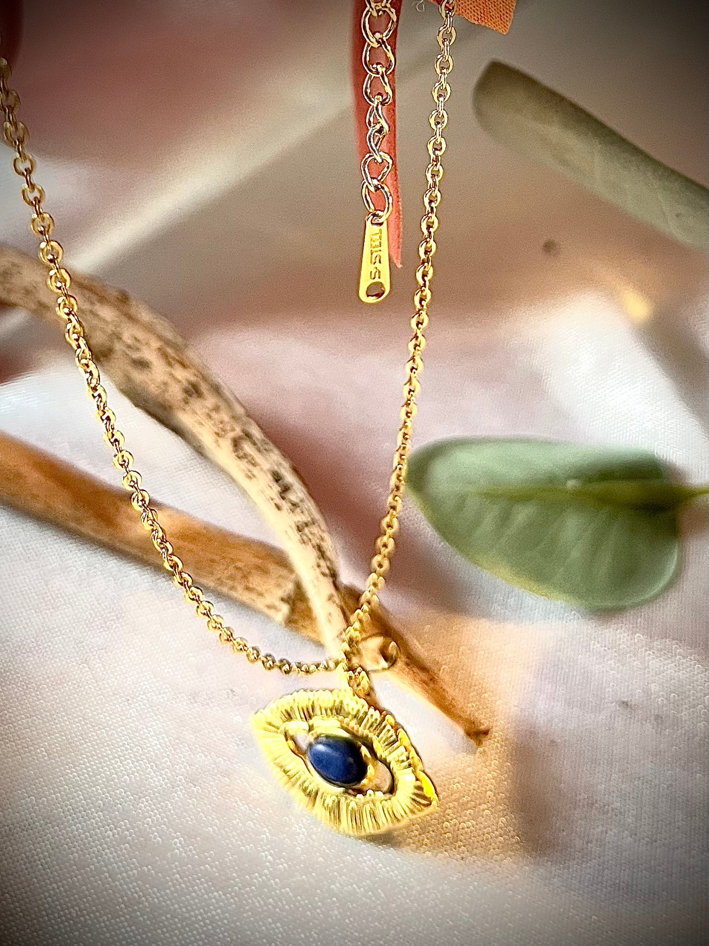 KEDA l Collier doré œil et pierre bleu