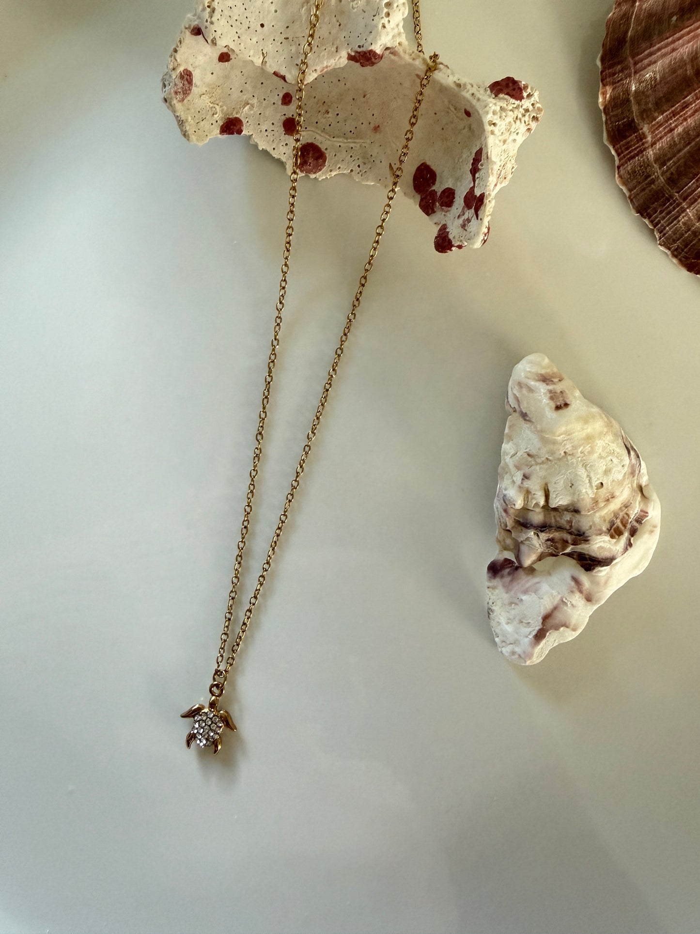 Tika l Collier tortue 🐢 doré et zircon blanc