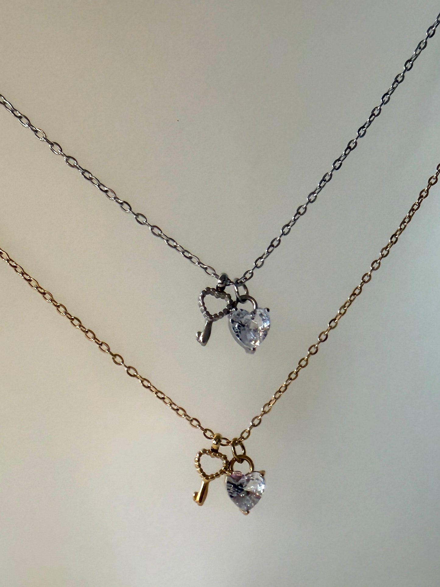 Infini l collier cœur clé argenté et/ou doré