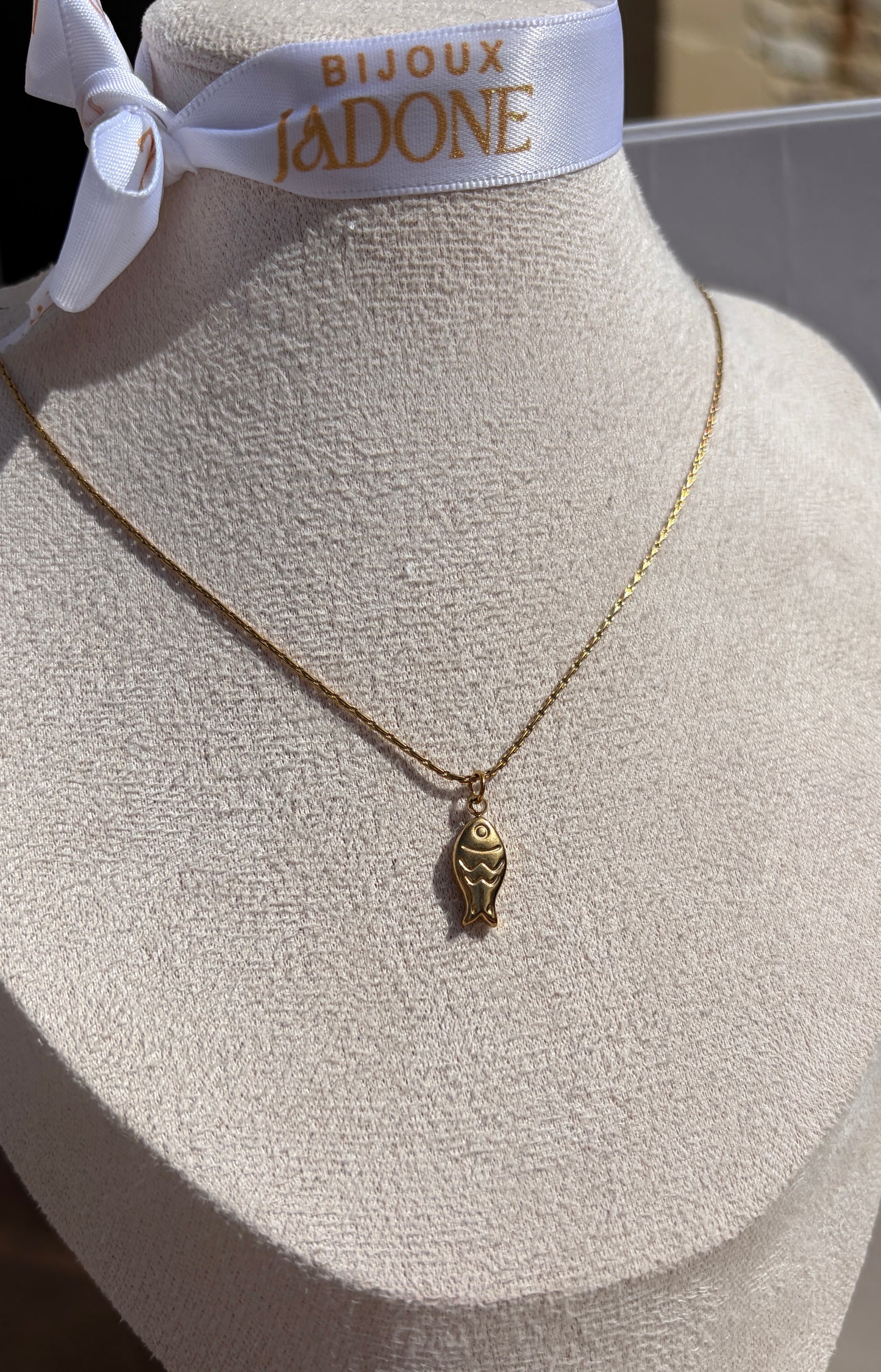 Huna l collier doré poisson 🐟