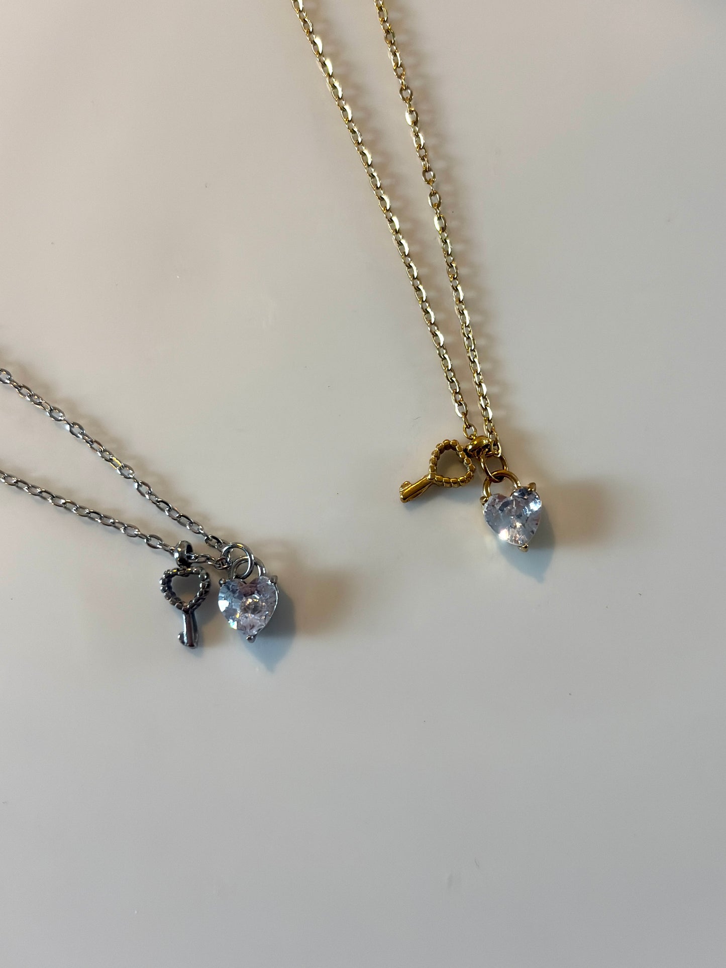 Infini l collier cœur clé argenté et/ou doré