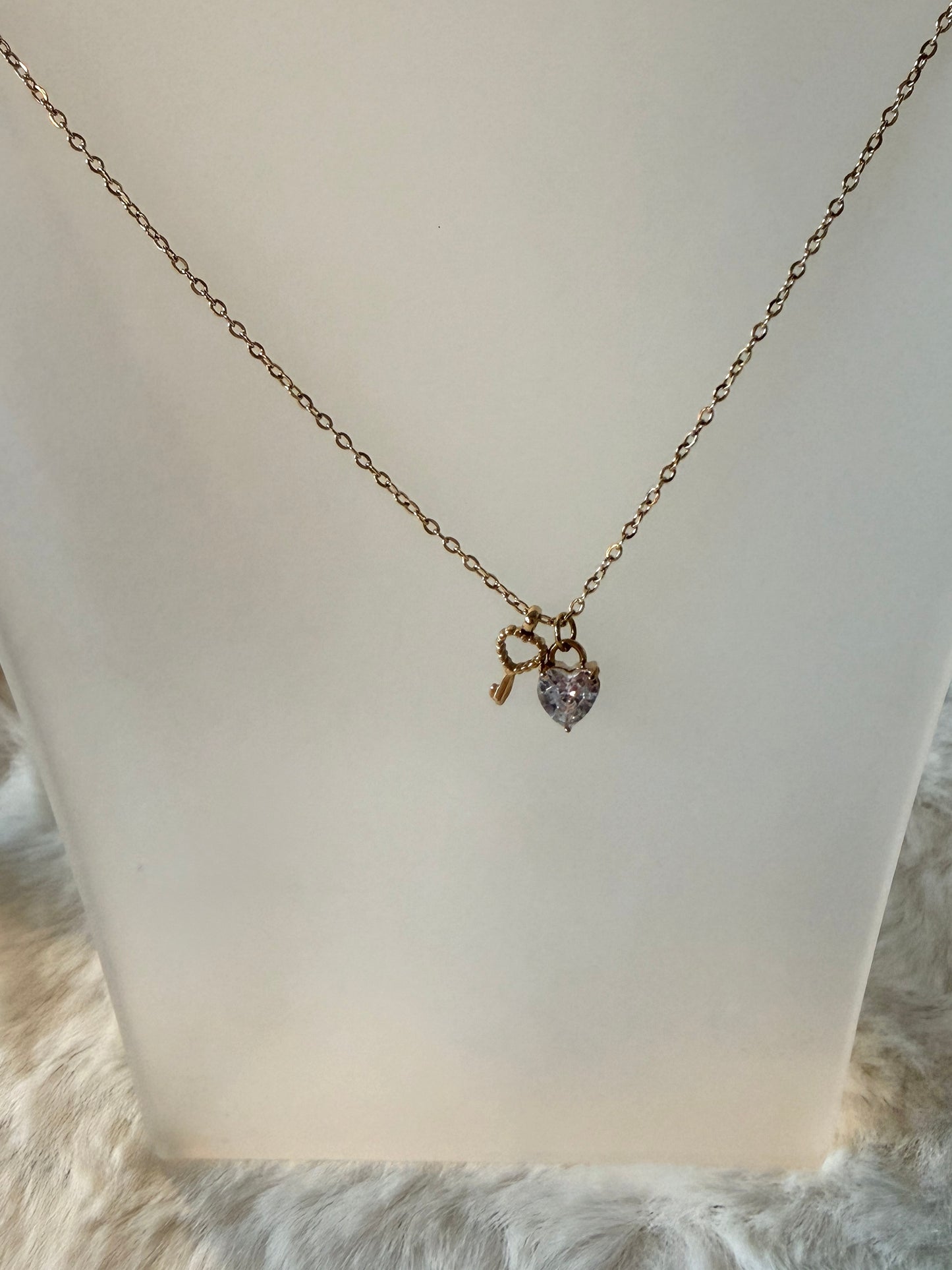 Infini l collier cœur clé argenté et/ou doré